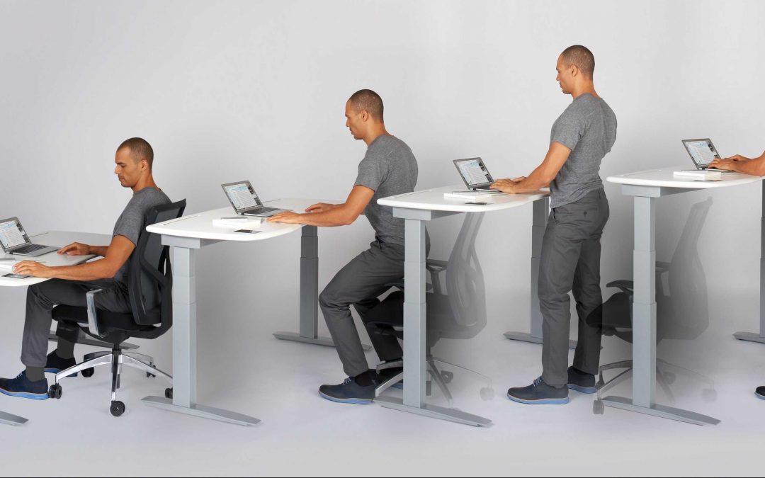 can a standing desk reduce back pain